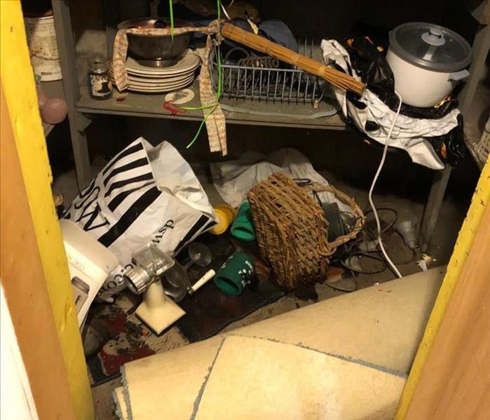 A photo of stored contents in a basement.